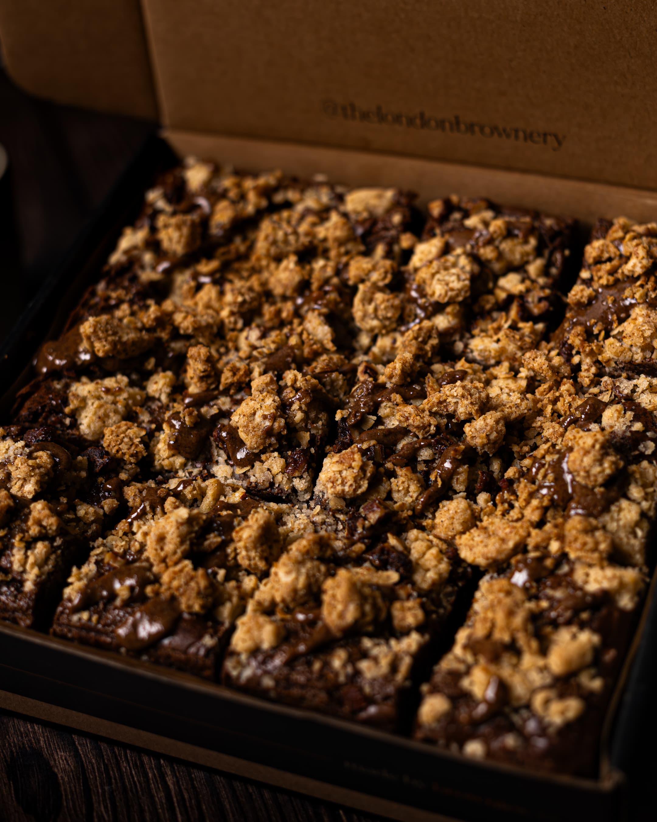 a box of 12 pecan crumble brownies