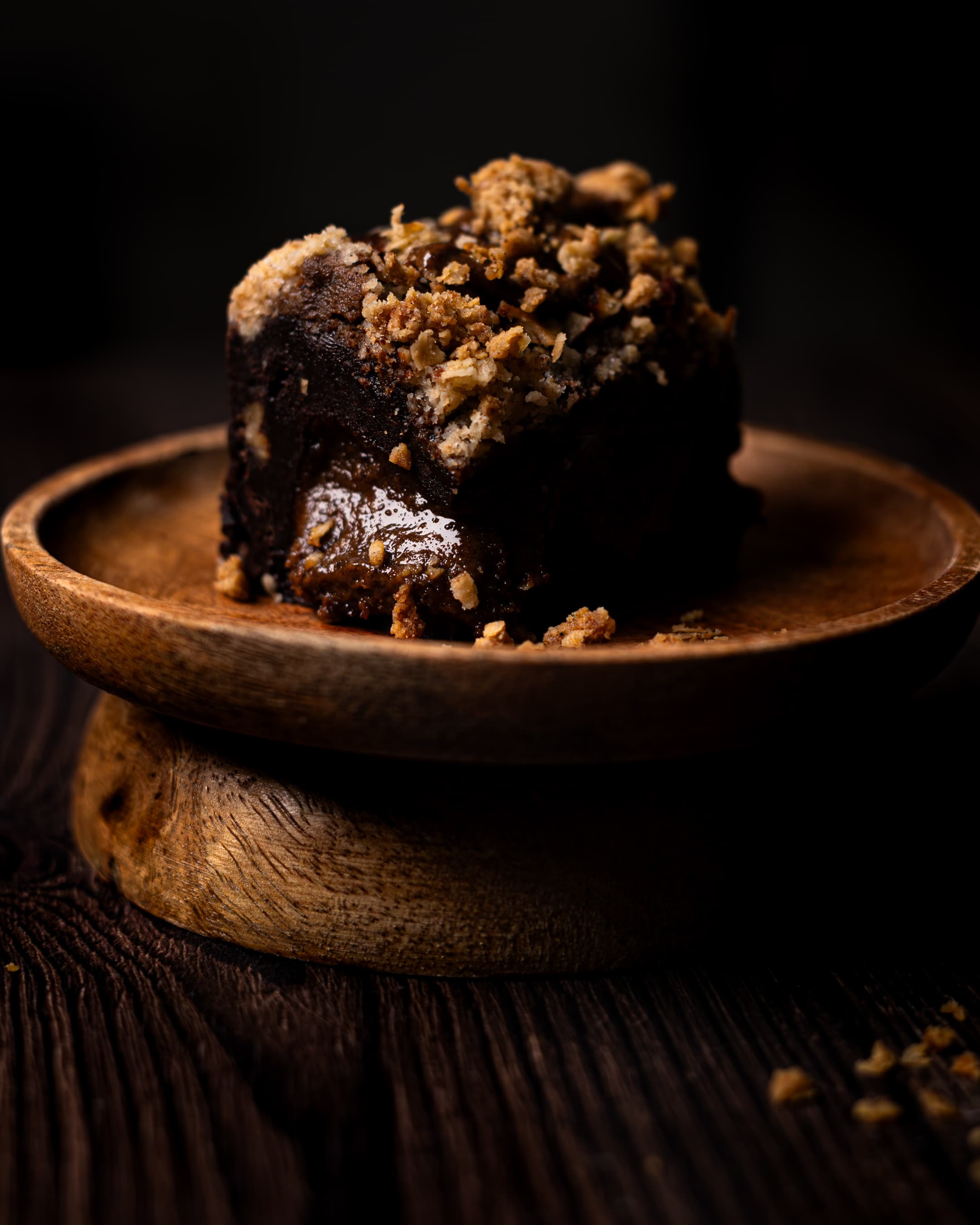 pecan crumble brownie with maple-roasted pecan praline oozing out.